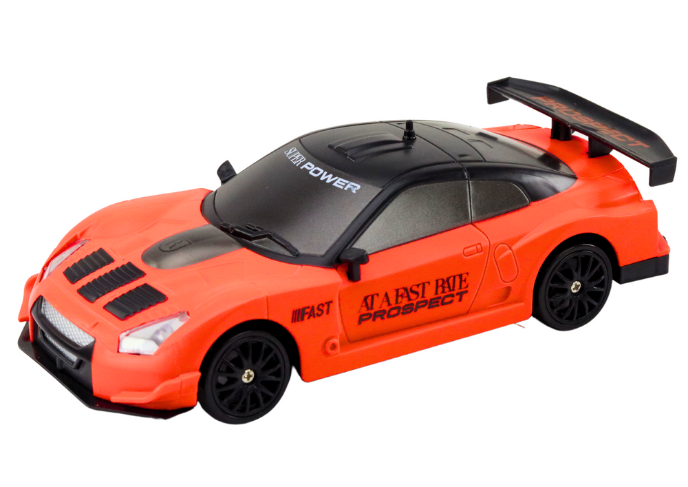 Sportski auto na daljinsko upravljanje sa zamjenjivim kotačima 1:24 - narančasti