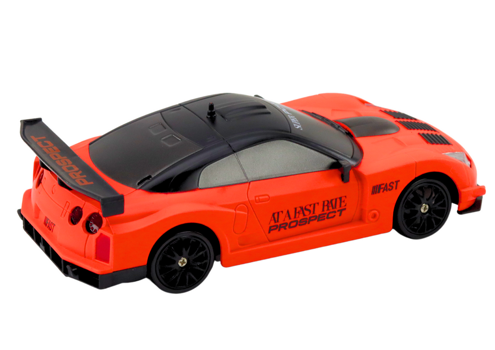 Sportski auto na daljinsko upravljanje sa zamjenjivim kotačima 1:24 - narančasti