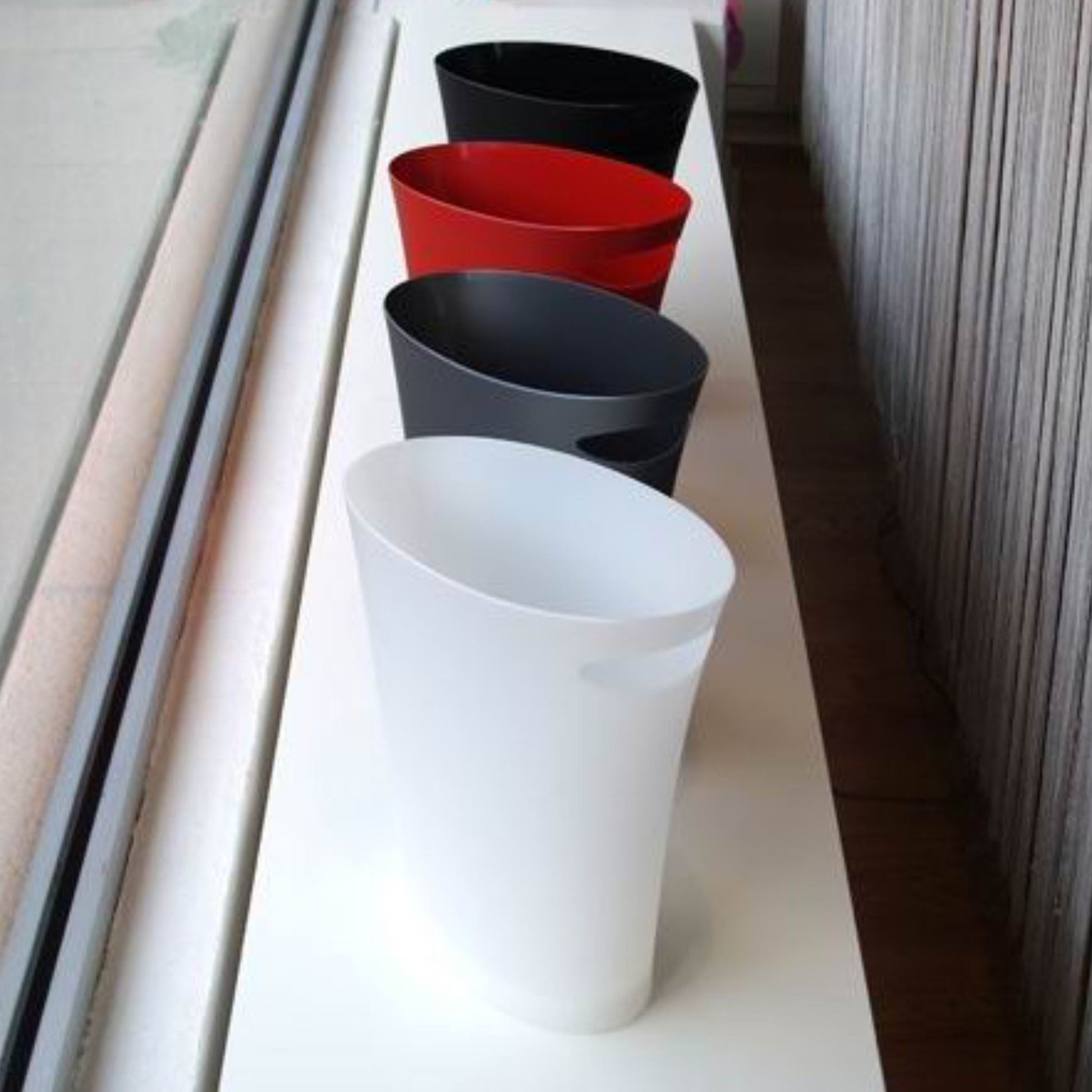 6848f24326e70829cfc6ee88_black-wastebasket-skinnyc_1774682573483.jpg